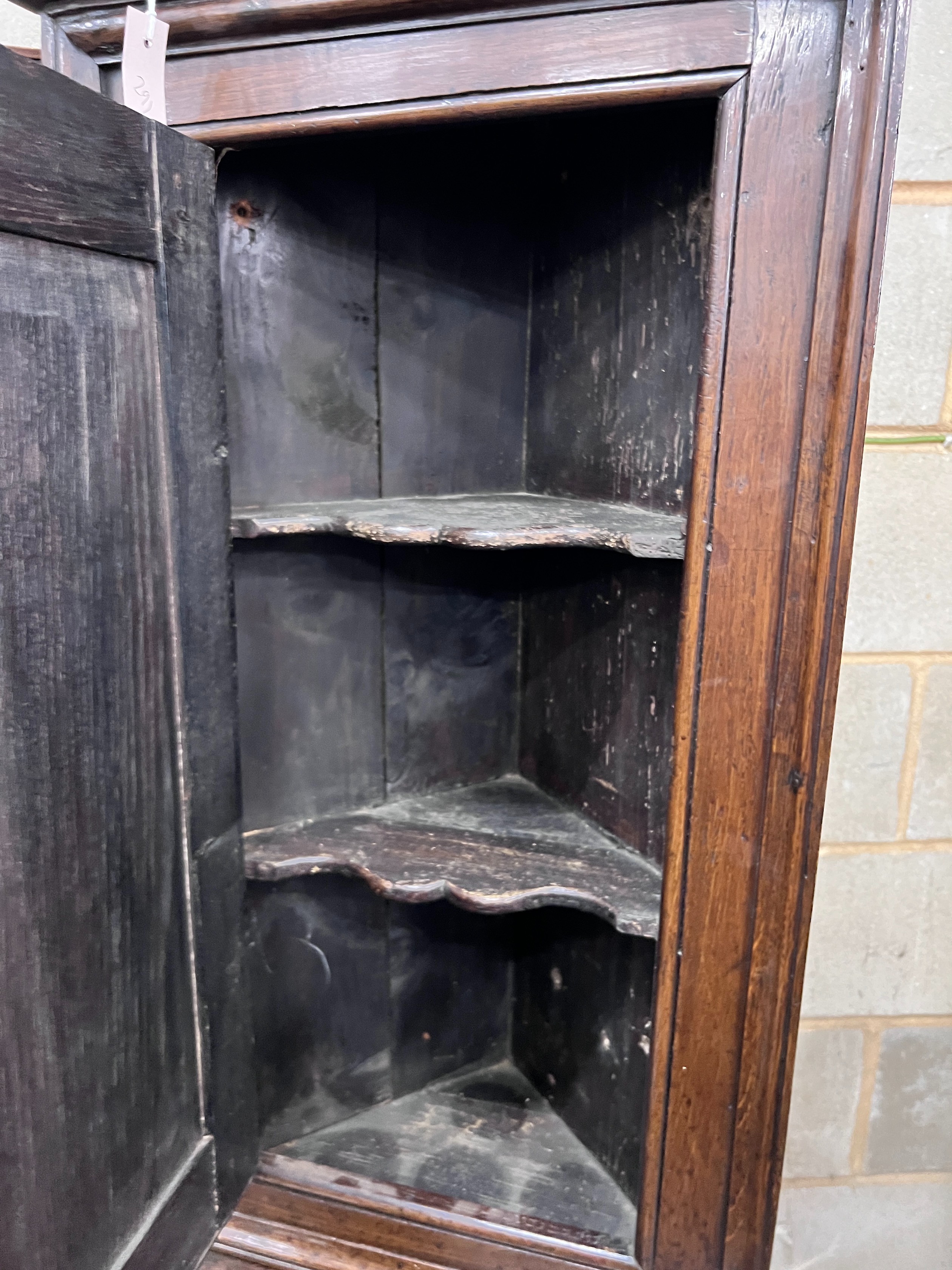 Two 18th century style hanging corner cupboards, one in oak, the other walnut, width 52cm and 70cm *Please note the sale commences at 9am.